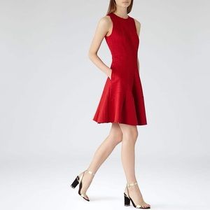 Reiss Pinot Flounce Dress with Laser Cut Details.